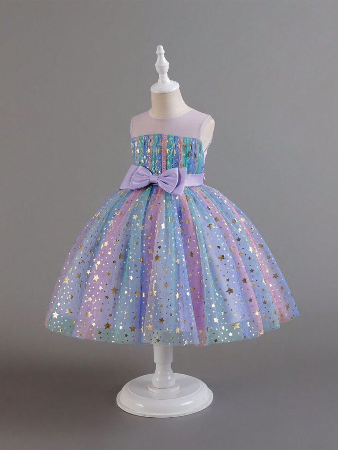 Vestido de estrellas doradas y tul