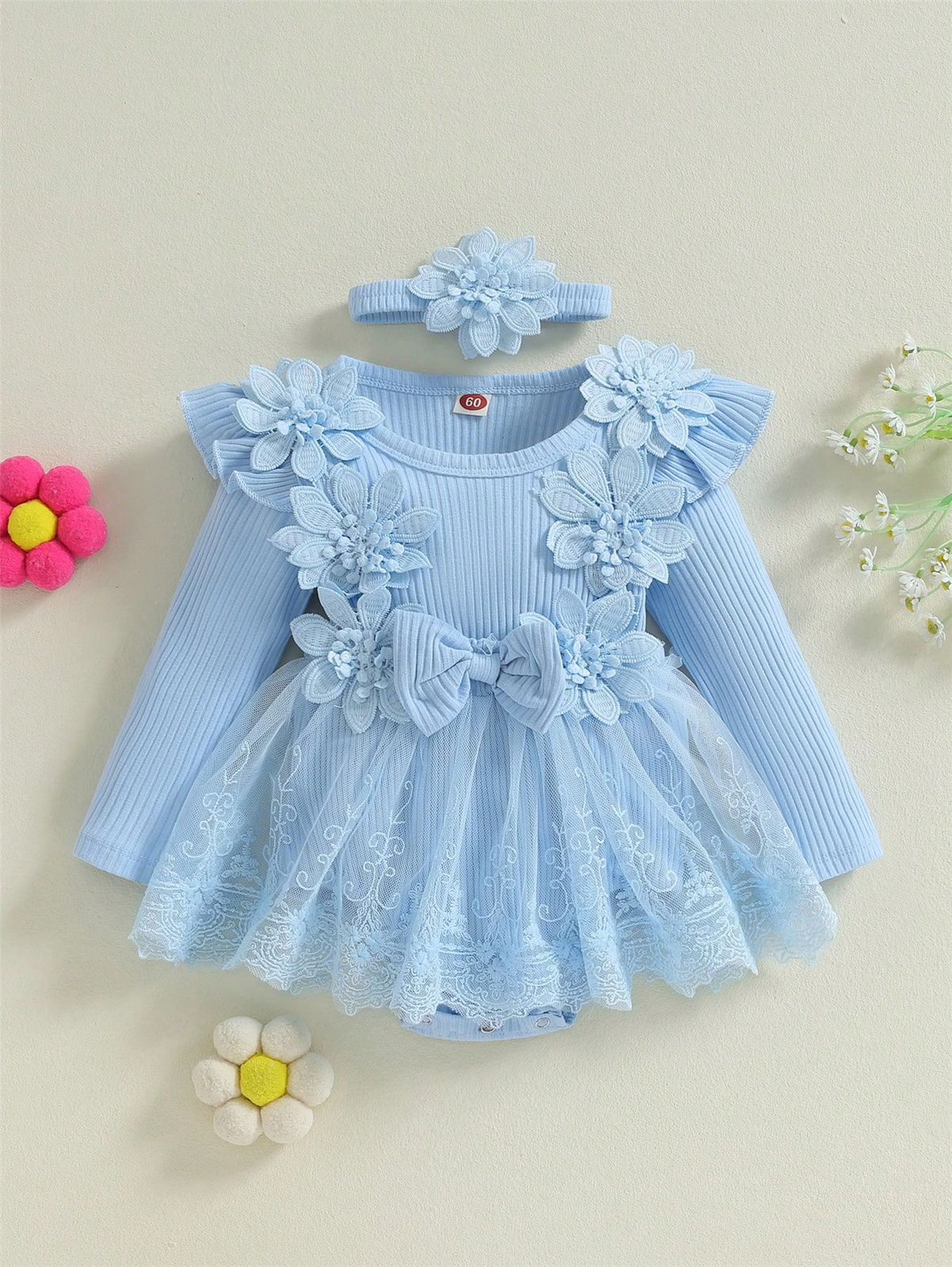 Vestido celeste flores y moño